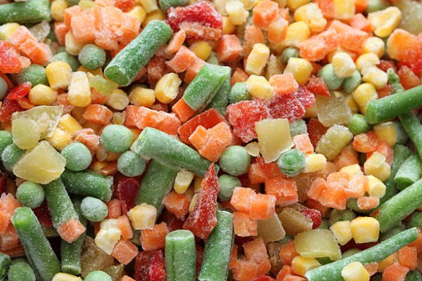 Heap of frozen vegetables. Close-up.