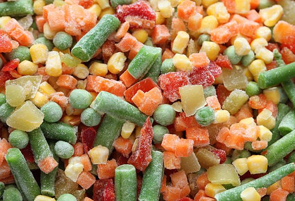 Heap of frozen vegetables. Close-up.